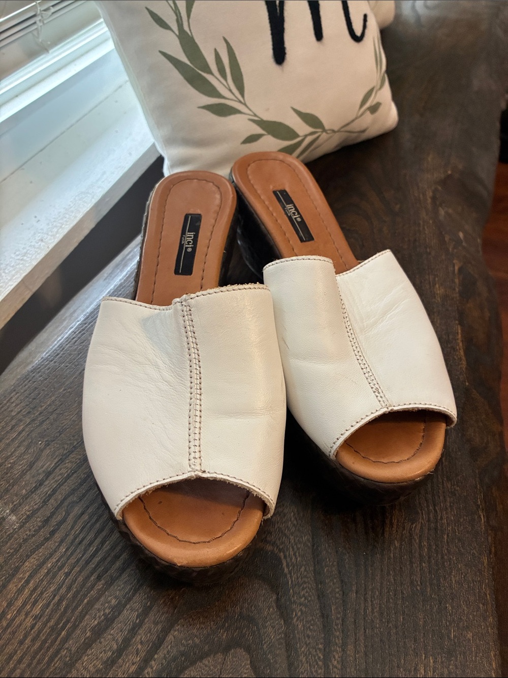 Women’s white slip-on wedge sandal with brown heel